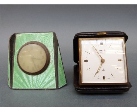 Mid 20th Century eight day travel alarm in original case, the 55mm ivory coloured dial, with baton numerals, the movement by 