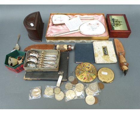 A quantity of items to include a bakelite box, plated spoons, boxed dressing table set, playing card set, bag of coins, woode