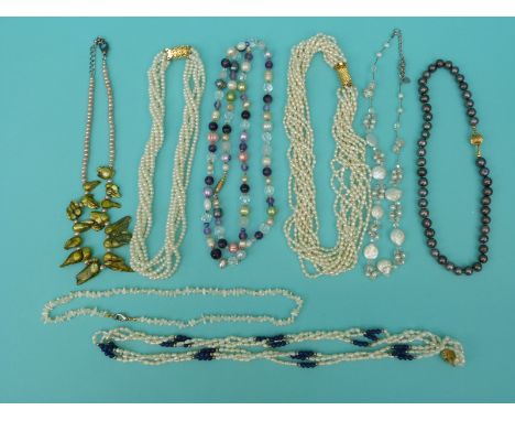 Eight pearl necklaces including two multi strand examples, a multi coloured example, irregular green strand etc 