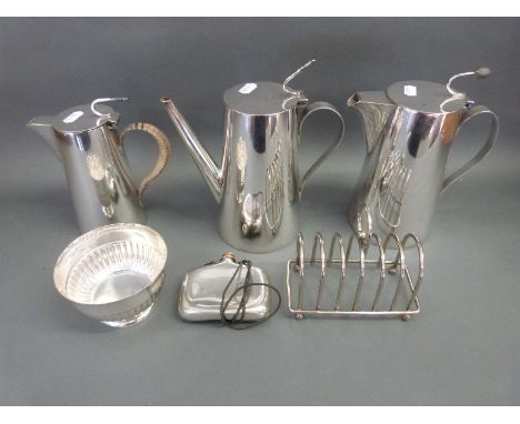 A graduated set of three Asprey silver plated lidded jugs, largest 22cm tall, together with a plated sugar bowl, toast rack a