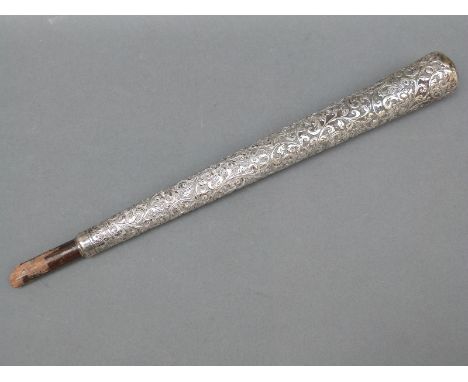 A white metal Indian walking stick or parasol handle with floral decoration, length 26cm