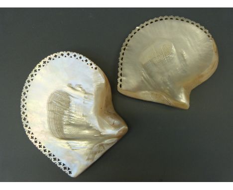 Two large mother of pearl carved and pierced shells, width 23cm