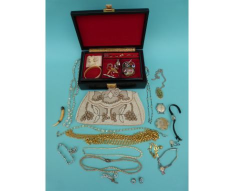 A collection of jewellery including early 19thC carved ivory brooch depicting a moth, worked miniature tusk, guilloche enamel
