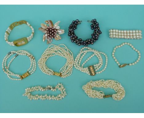Eight pearl bracelets including freshwater pearls, cultured pearls, a watch with a pearl strap etc 
