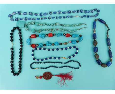 A lapis lazuli beaded necklace, sodalite, pearl and lapis lazuli and turquoise examples etc