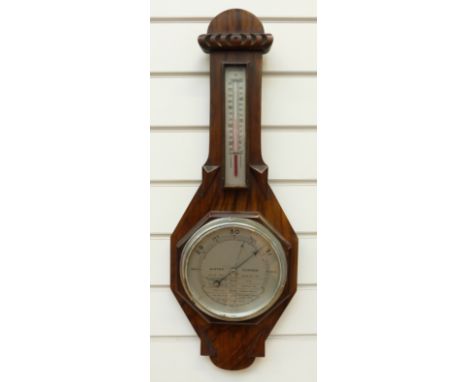 A British made aneroid wall barometer/thermometer, 17cm dial