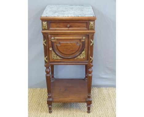 A 19thC continental gilt metal mounted marble topped pot cupboard with single drawers and cupboard below raised on reeded leg