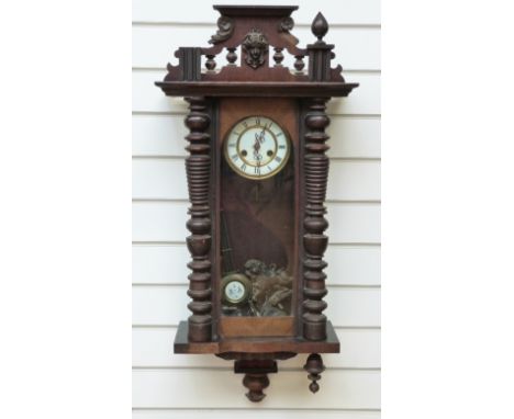 Vienna style regulator wall clock with turned decoration the Roman enamel dial with pierced trefoil hands