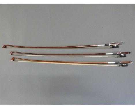 Three violin bows with mother of pearl inlay to frogs