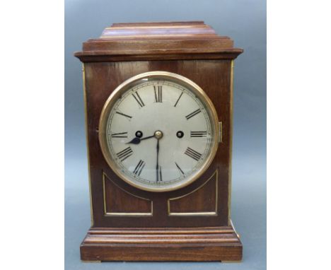 A Winterhalder and Hofmeier shelf clock in mahogany case the silvered Roman dial with spade hands, the movement chiming on fi