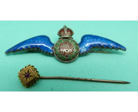 A silver and enamel RAF sweetheart brooch and a 9ct gold pin set with a ruby