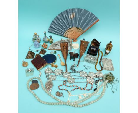 A netsuke, a white metal box, two inlaid Japanese Shibayama napkin rings, beads, compacts, hair comb, enamel vases, filigree 