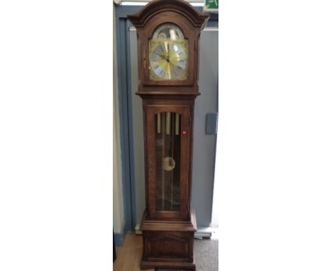 Richard Broad modern oak longcased clock with moon phase brass dial, contracting Roman silvered chapter ring and Westminster 
