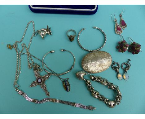 A Victorian silver bracelet, silver bangles, a silver cross set with a ruby, silver earrings set with faux moonstones, pendan