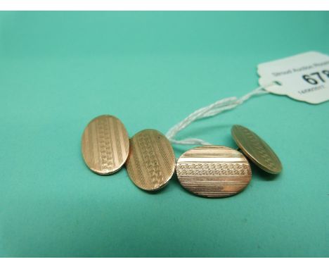 A pair of 9ct gold cufflinks with engine turned decoration, 11.4g. 