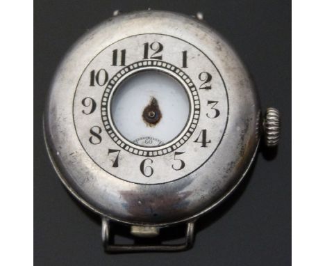 A silver half hunter military style wristwatch with black enamel numerals to the outer case, subsidiary seconds dial and Arab