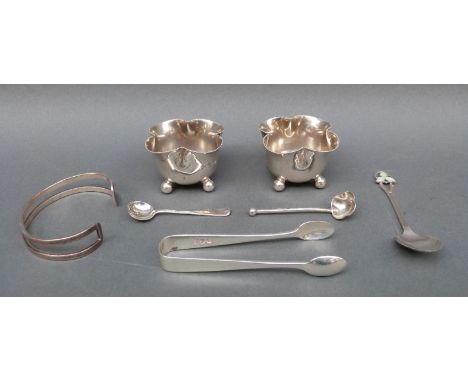 A pair of Edward VII hallmarked silver quatrefoil open salts, London 1905, two silver salt spoons, silver sugar tongs, bangle