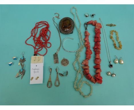 A silver St Christopher, silver ingot, silver rings, coral necklace, a pair of 9ct gold earrings, silver earrings, silver ban