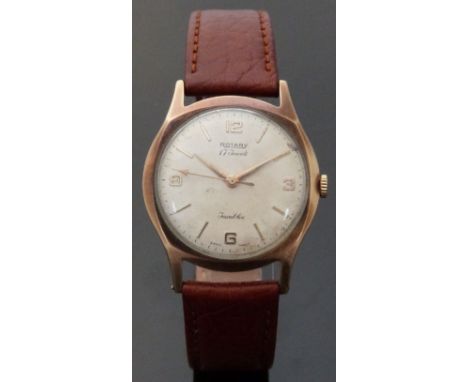 Rotary 9ct gold gentleman's wristwatch with gold hands and markers and champagne face, on brown leather strap, case diameter 