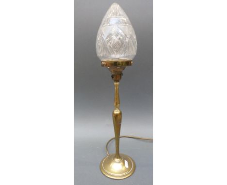 A brass lamp with a cut glass shade, height 50cm 