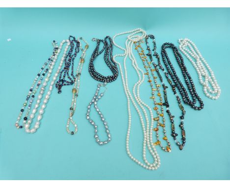 Eleven pearl necklaces including freshwater pearls in different colours, some extremely long examples