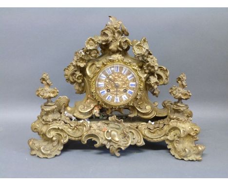 Vincent et Cie 19th century French Ormolu Louis style brass cased mantel clock, decorated in floral and foliate design, the R