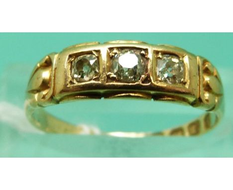 An 18ct gold ring set with three diamonds, Birmingham 1890 (Size K)