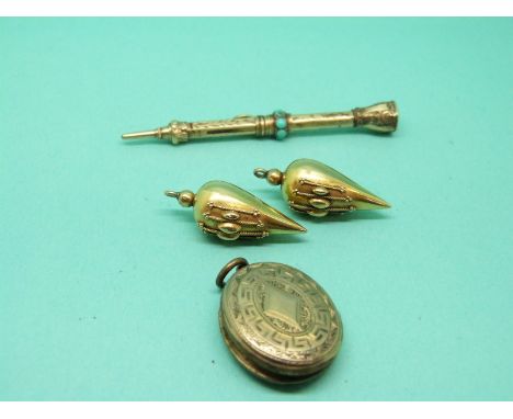 Two Victorian yellow metal earrings, a Victorian mourning locket inlaid with enamel and a yellow metal pencil set with turquo