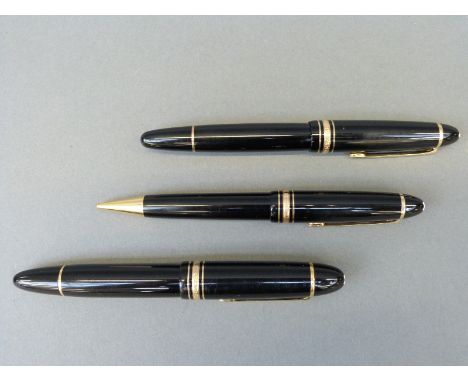 Montblanc Meisterstuck 149 fountain pen, rollerball pen and propelling pencil set all with black resin barrels and caps and y