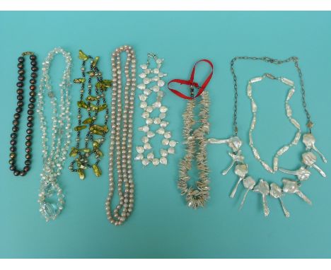 Eight pearl necklaces including a large single strand of Tahitian cultured pearls, freshwater pearls, a single strand of alte