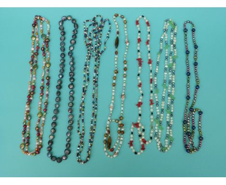 Seven pearl necklaces including freshwater in different colours, some irregular shapes