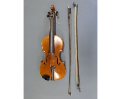 A Stradivarius copy violin labelled 'Antonius Straduarius Cremona faciebat Anno 1722, with 2 bows