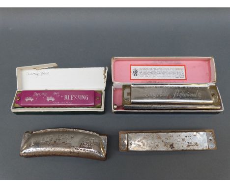 Hohner 12 hole 'Larry Adler Professional' chromatic harmonica in the key of C in original box, together with three other harm