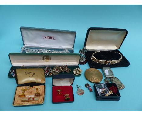 A collection of vintage brooches and necklace, vesta, cufflinks, golly brooch etc with a pewter model of a miner