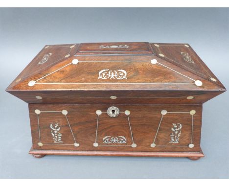 A Victorian mother of pearl inlaid rosewood tea caddy having two lidded compartments flanking a glass mixing bowl, width 36cm