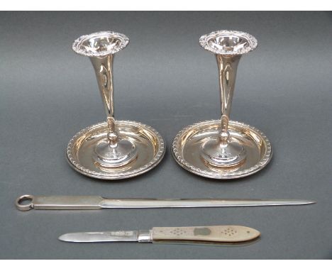 A hallmarked silver letter opener formed as a meat skewer, Birmingham 1962 maker Adie Brothers, together with a pair of simil