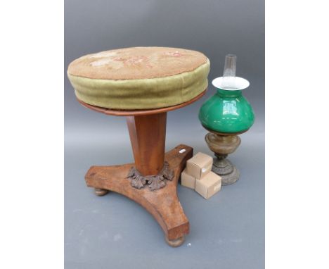 A small 19th/20thC oil lamp and three boxed wicks, adjustable table, a piano stool, with tripod base and acanthus detail