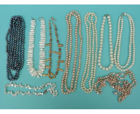 Nine pearl necklaces including freshwater pearls in different colours including some extremely long examples