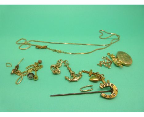 A 9ct gold necklace, 9ct gold locket, Victorian stick pin in the form of a horse shoe set with seed pearls, yellow metal item