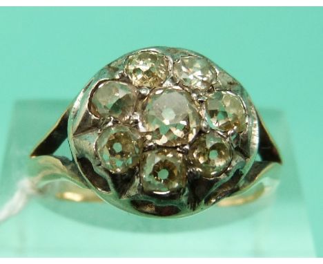 A Georgian/Victorian ring set with old mine cut diamonds in a cluster (Size M)