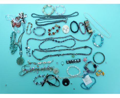 A silver necklace, pearl bracelets, quartz bracelets, pyrite bracelet etc