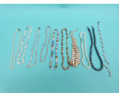 Ten pearl necklaces including freshwater in different colours including some irregular shapes