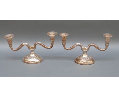 A pair of Swedish hallmarked silver candelabra with import marks for Birmingham, width 23cm 