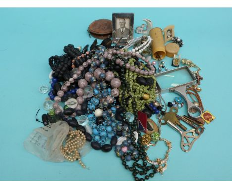 Costume jewellery including cloisonne necklace, jet, hallmarked silver photograph frame, a hallmarked silver pusher, pen nibs