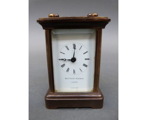 Early to mid 20th Century Swiss timepiece carriage clock in 'corniche' style brass case, white enamel Roman dial and blue ste