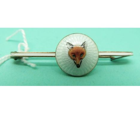 A bar brooch with circular guilloche enamel panel depicting a fox's head 