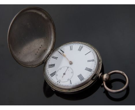 A silver gentleman's full hunter pocket watch with signed movement, inset subsidiary seconds dial, Roman numerals, gold hands