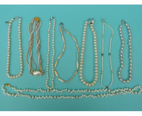 Eight strands of freshwater pearl necklaces in shades of pink