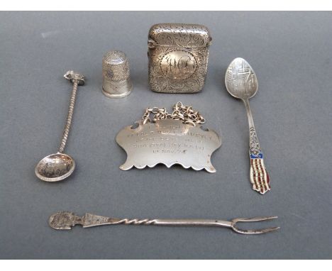 A hallmarked silver vesta, silver thimble, two white metal spoons and forks, and a hallmarked silver bottle ticket, weight of