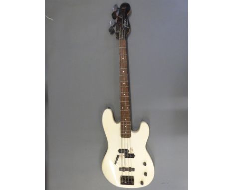 Axe electric bass guitar in ivory coloured finish fitted with USA Dimarzio pickups